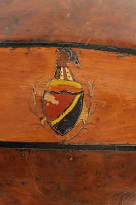 Lot 1212 - A LATE GEORGIAN SEGMENTED SATINWOOD AND BURR YEW DESK BOX FORMED AS A RUGBY BALL