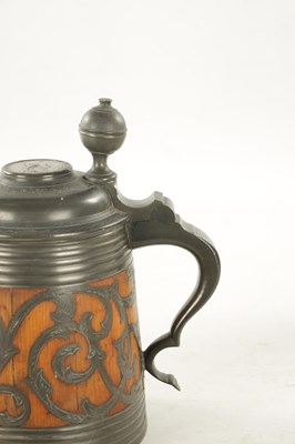 Lot 653 - A 19TH CENTURY SWEDISH COMMEMORATIVE OAK AND PEWTER TANKARD
