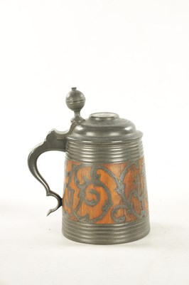 Lot 653 - A 19TH CENTURY SWEDISH COMMEMORATIVE OAK AND PEWTER TANKARD