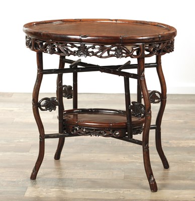 Lot 205 - A 19TH CENTURY CHINESE HARDWOOD OVAL SHAPED TWO-TIER TABLE