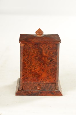 Lot 821 - AN EARLY 20TH CENTURY AMBOYNA CIGAR DISPENSER