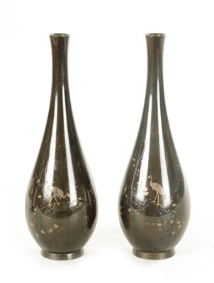 Lot 210 - A PAIR OF JAPANESE MEIJI PERIOD BRONZE AND MIXED METAL SLENDER OVOID VASE WITH INLAID STORK DECORATION