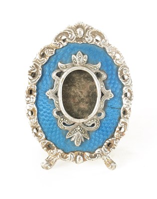 Lot 373 - A 19TH CENTURY RUSSIAN SILVER AND BLUE GUILLOCHE ENAMEL MINIATURE PHOTO FRAME