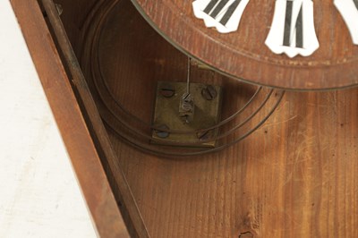 Lot 1105 - A 19TH CENTURY BLACK FOREST CARVED OAK HANGING WALL CLOCK