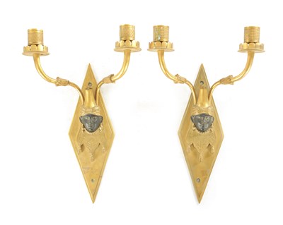 Lot 861 - ATT MAISON BAGUESE A PAIR OF EARLY 20TH CENTURY GILT BRONZE AND COLD PAINTED BRONZE WALL LIGHTS