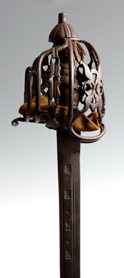 Lot 338 - AN EARLY 18th CENTURY SCOTTISH BASKET HILTED...