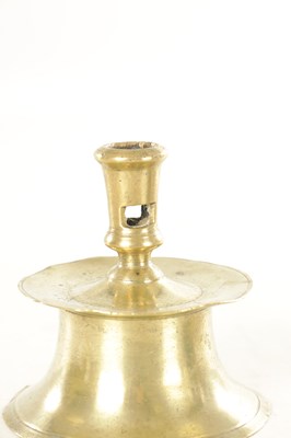 Lot 889 - A RARE 17TH CENTURY BELL BASE / CAPSTAN BRASS CANDLESTICK