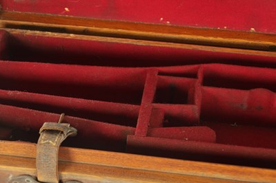 Lot 511 - A FINE QUALITY EARLY 20TH CENTURY PURDY & SONS OAK AND LEATHER GUN CASE