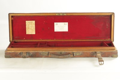Lot 511 - A FINE QUALITY EARLY 20TH CENTURY PURDY & SONS OAK AND LEATHER GUN CASE
