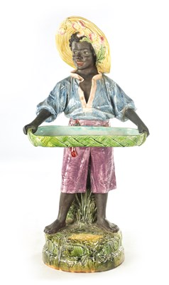 Lot 58 - A LARGE EARLY 20TH CENTURY MAJOLICA FIGURAL SCULPTOR