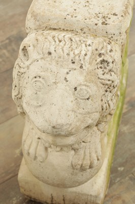 Lot 840 - A PAIR OF CARVED LIMESTONE WINGED LIONS