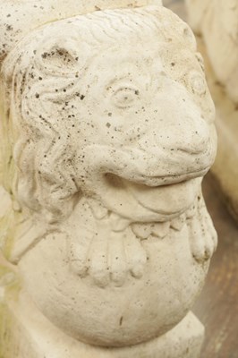 Lot 840 - A PAIR OF CARVED LIMESTONE WINGED LIONS