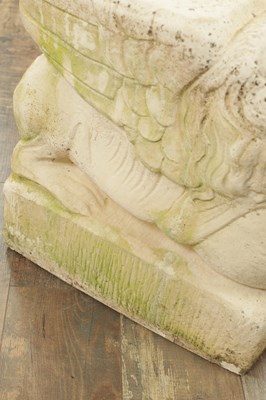 Lot 840 - A PAIR OF CARVED LIMESTONE WINGED LIONS