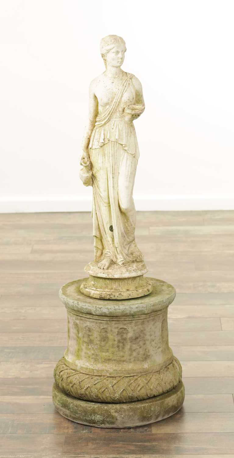 Lot 752 - A CARVED WHITE LIMESTONE OF A MAIDEN