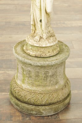 Lot 752 - A CARVED WHITE LIMESTONE OF A MAIDEN