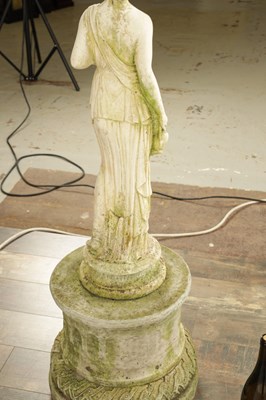 Lot 752 - A CARVED WHITE LIMESTONE OF A MAIDEN