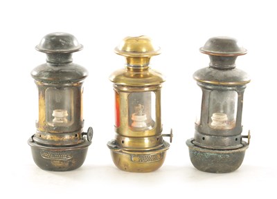 Lot 748 - A SET OF THREE “PARKLITE” BRASS CAR LAMPS