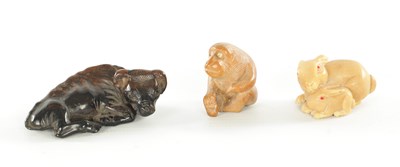 Lot 208 - TWO JAPANESE CARVED BOXWOOD NETSUKE AND A RESIN NETSUKE