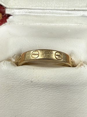 Lot 235 - AN 18CT GOLD CARTIER LOVE RING