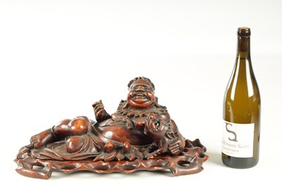 Lot 128 - A LATE 19TH CENTURY CHINESE CARVED HARDWOOD SCULPTURE