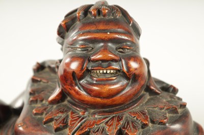 Lot 128 - A LATE 19TH CENTURY CHINESE CARVED HARDWOOD SCULPTURE