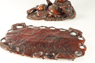 Lot 128 - A LATE 19TH CENTURY CHINESE CARVED HARDWOOD SCULPTURE