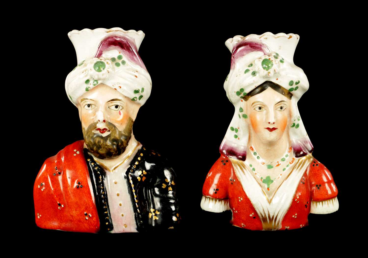 Lot 63 - A PAIR OF 19TH CENTURY FIGURAL STAFFORDSHIRE VASES