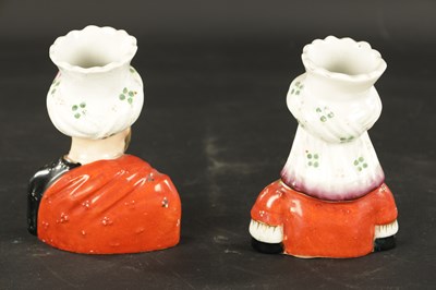 Lot 63 - A PAIR OF 19TH CENTURY FIGURAL STAFFORDSHIRE VASES
