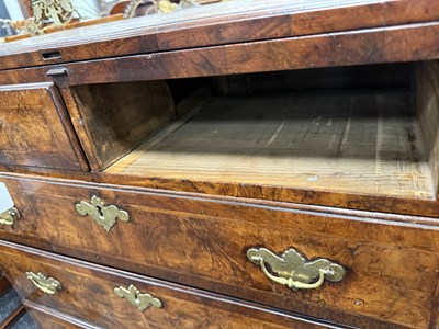 Lot 1415 - AN EARLY 18TH CENTURY FIGURED WALNUT AND HERRING BANDED BACHELORS CHEST