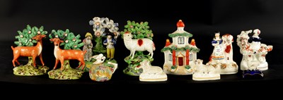 Lot A GROUP OF ELEVEN 19TH CENTURY STAFFORDSHIRE FIGURES