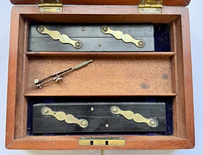 Lot 559 - ROBSON, NEWCASTLE ON TYNE. A 19TH CENTURY BRASS BOUND MAHOGANY CASED SET OF DRAWING INSTRUMENTS