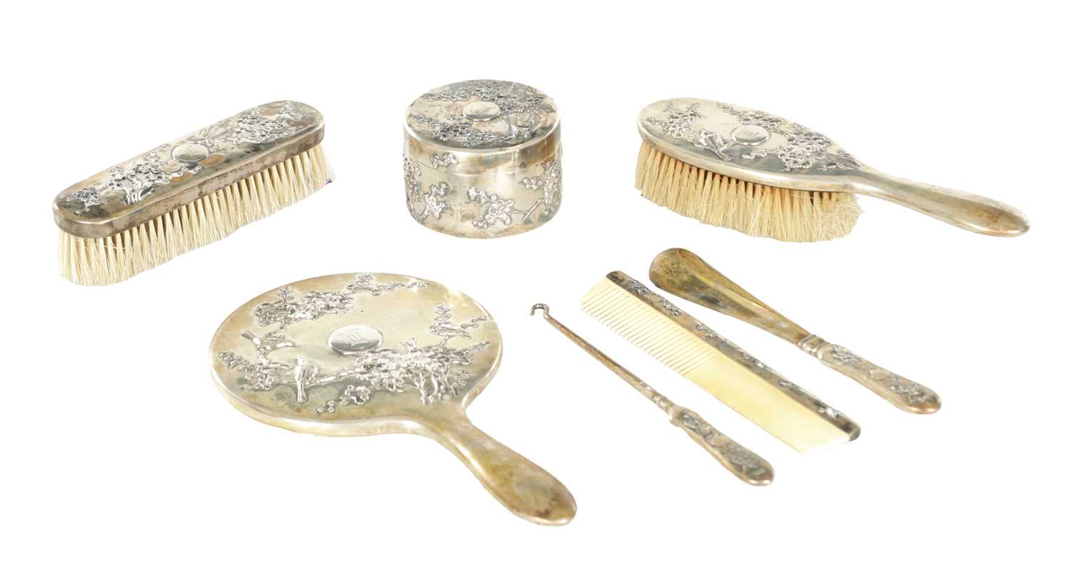 Lot 200 - A LATE 19TH CENTURY CHINESE EXPORT SILVER DRESSING TABLE SET BY WING NAM