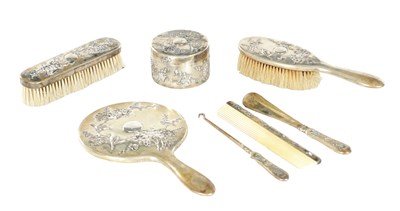 Lot 200 - A LATE 19TH CENTURY CHINESE EXPORT SILVER DRESSING TABLE SET BY WANG HING