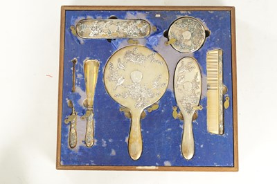 Lot 200 - A LATE 19TH CENTURY CHINESE EXPORT SILVER DRESSING TABLE SET BY WING NAM