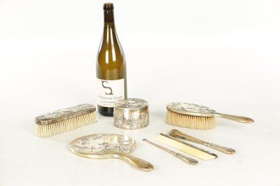 Lot 200 - A LATE 19TH CENTURY CHINESE EXPORT SILVER DRESSING TABLE SET BY WING NAM