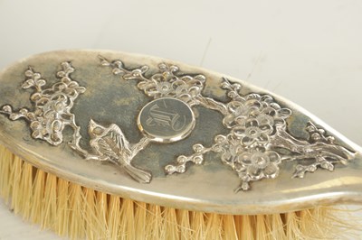 Lot 200 - A LATE 19TH CENTURY CHINESE EXPORT SILVER DRESSING TABLE SET BY WING NAM