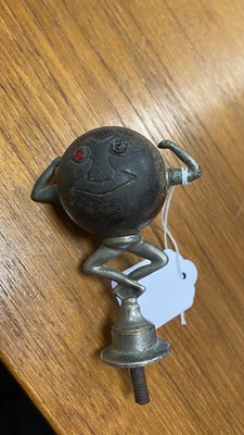 Lot 595 - A RARE ‘TOUCH-WUD’ 1920’S CAR MASCOT