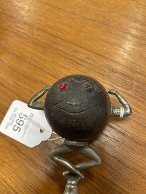 Lot 595 - A RARE ‘TOUCH-WUD’ 1920’S CAR MASCOT