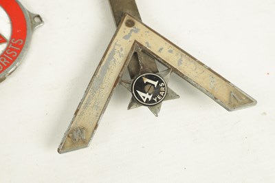Lot 587 - A COLLECTION OF THREE VINTAGE CHROME PLATED ENAMEL CAR BADGES