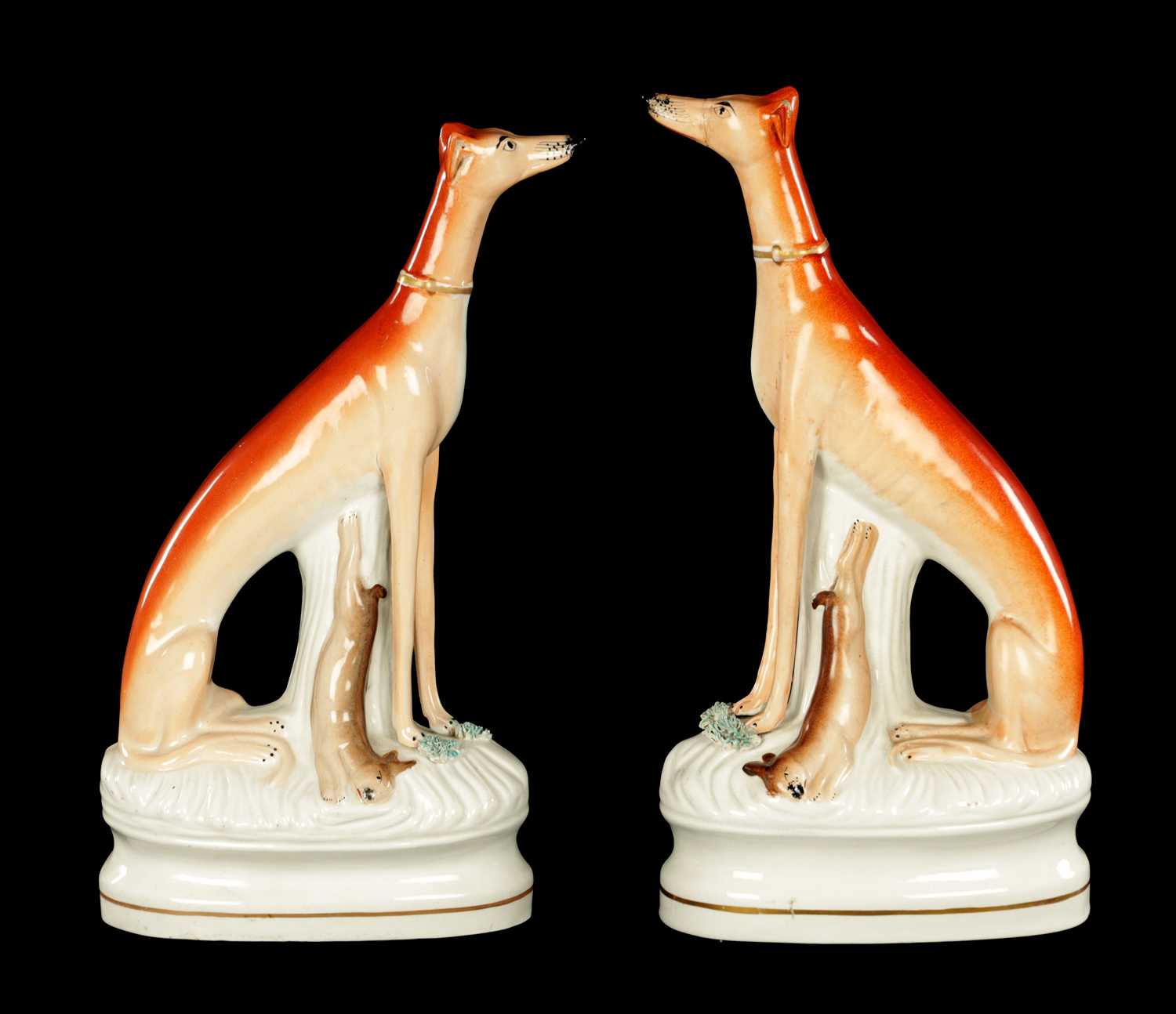 Lot 99 - A GOOD PAIR OF 19TH CENTURY STAFFORDSHIRE GREY HOUNDS
