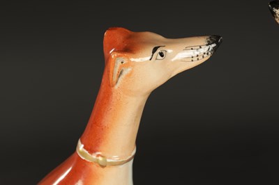Lot 99 - A GOOD PAIR OF 19TH CENTURY STAFFORDSHIRE GREY HOUNDS