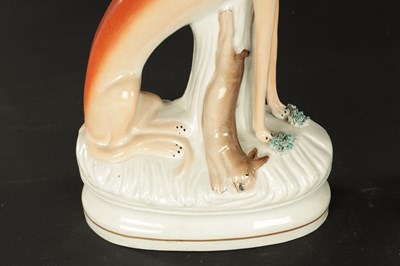 Lot 99 - A GOOD PAIR OF 19TH CENTURY STAFFORDSHIRE GREY HOUNDS