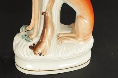 Lot 99 - A GOOD PAIR OF 19TH CENTURY STAFFORDSHIRE GREY HOUNDS