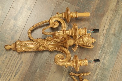 Lot 696 - A SET OF FOUR CARVED GILTWOOD ADAM STYLE HANGING WALL LIGHTS