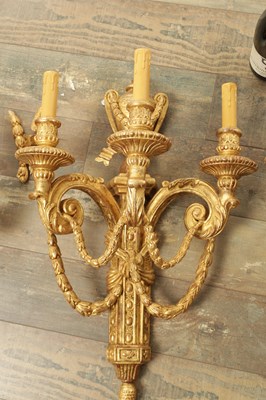 Lot 696 - A SET OF FOUR CARVED GILTWOOD ADAM STYLE HANGING WALL LIGHTS