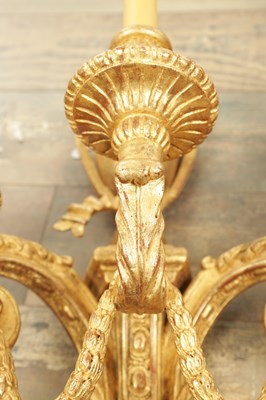 Lot 696 - A SET OF FOUR CARVED GILTWOOD ADAM STYLE HANGING WALL LIGHTS