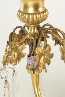 Lot 606 - A 19TH CENTURY FRENCH BRONZE AND ORMOLU THREE PIECE CANDELABRA GARNITURE