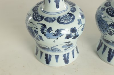 Lot 109 - A PAIR OF LATE 17TH CENTURY BLUE AND WHITE DELFT VASES