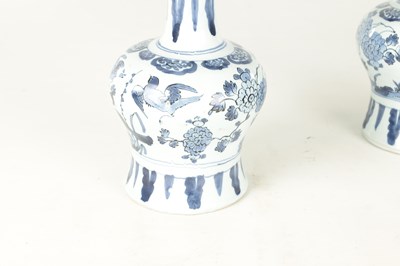 Lot 109 - A PAIR OF LATE 17TH CENTURY BLUE AND WHITE DELFT VASES