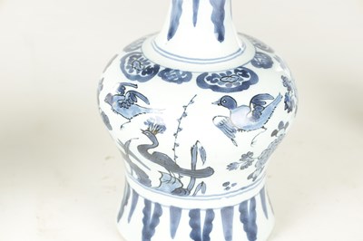 Lot 109 - A PAIR OF LATE 17TH CENTURY BLUE AND WHITE DELFT VASES
